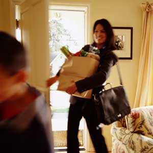 Picture of working mom arriving home