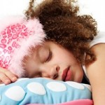 Young Girl Asleep on Pillow --- Image by © Royalty-Free/Corbis